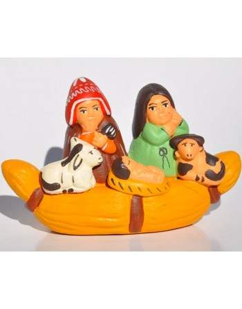 Crèche dans une canoé